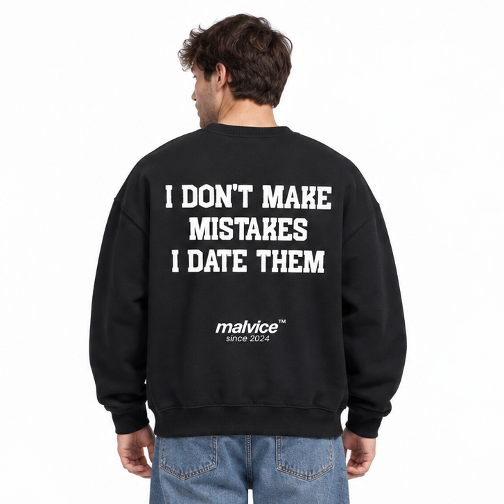 I DON'T MAKE MISTAKES I DATE THEM Oversized Sweatshirt — black Sweatshirt on man model, white studio