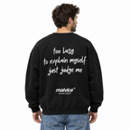 TOO LAZY TO EXPLAIN MYSELF JUST JUDGE ME Oversized Sweatshirt — black Sweatshirt on man model, white studio
