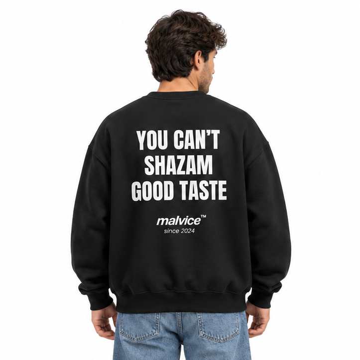 YOU CAN’T SHAZAM GOOD TASTE Oversized Sweatshirt — black Sweatshirt on man model, white studio