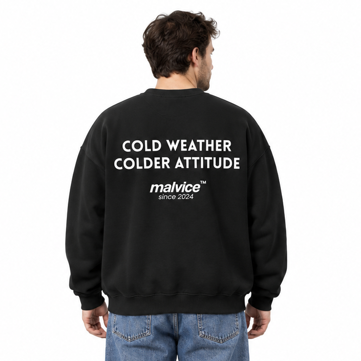 COLD WEATHER COLDER ATTITUDE Oversized Sweatshirt — black Sweatshirt on man model, white studio