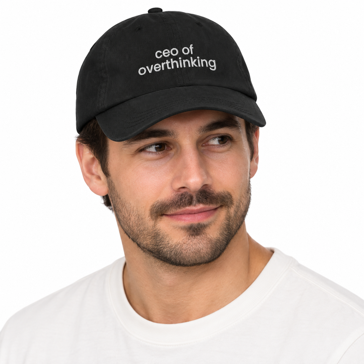 CEO OF OVERTHINKING Adjustable Dad Hat — black Cap on man model, white studio