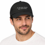 IF I'M TOO MUCH, GO FIND LESS Adjustable Dad Hat — black Cap on man model, white studio