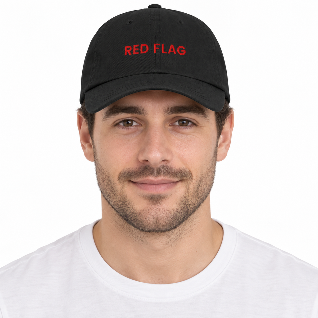 RED FLAG Adjustable Dad Hat — black Cap on man model, white studio