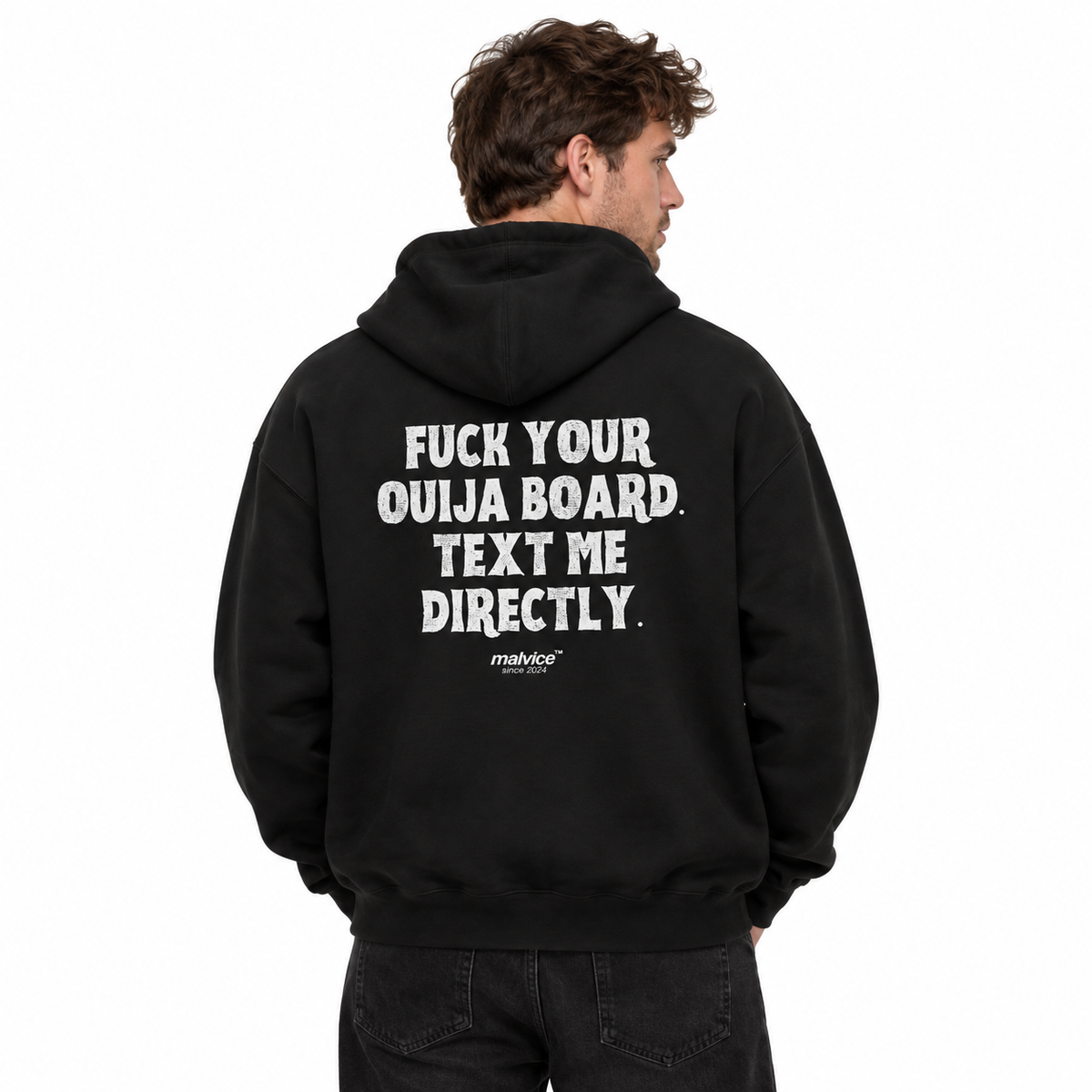 MALVICE N001 — FUCK YOUR OUIJA BOARD. TEXT ME DIRECTLY Oversized Hoodie — male model wearing black hoodie, back view, white studio