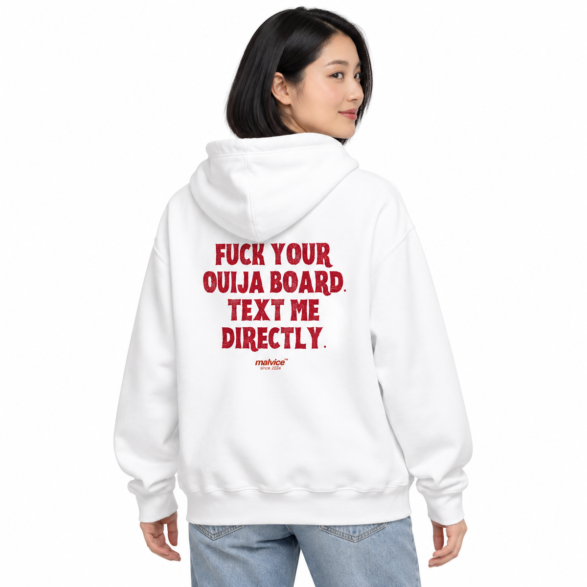 MALVICE N001 — FUCK YOUR OUIJA BOARD. TEXT ME DIRECTLY Oversized Hoodie — female model wearing white hoodie, back view, white studio