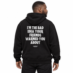 N012 I’M THE BAD IDEA YOUR FRIENDS WARNED YOU ABOUT Oversized Hoodie — black hoodie on male model, white studio — MALVICE