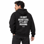 N014 I’M NOT HEARTLESS. IT’S JUST MISSING Oversized Hoodie — black hoodie on male model, white studio — MALVICE