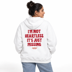 N014 I’M NOT HEARTLESS. IT’S JUST MISSING Oversized Hoodie — white hoodie on female model, white studio — MALVICE