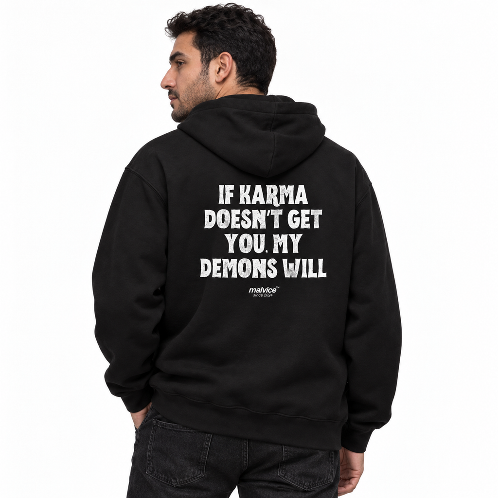 N015 IF KARMA DOESN’T GET YOU, MY DEMONS WILL Oversized Hoodie — black hoodie on male model, white studio — MALVICE