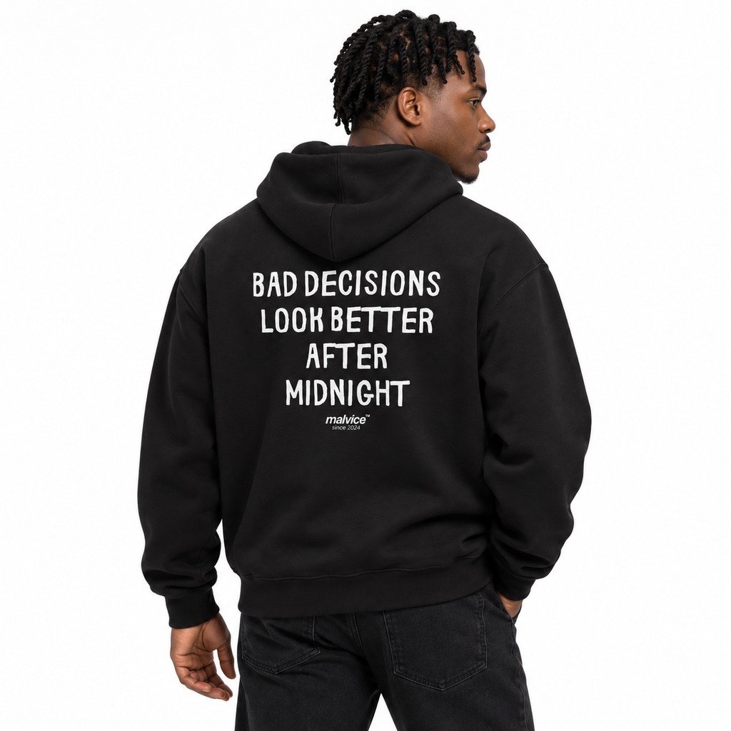N017 BAD DECISIONS LOOK BETTER AFTER MIDNIGHT Oversized Hoodie — black hoodie on male model, white studio — MALVICE