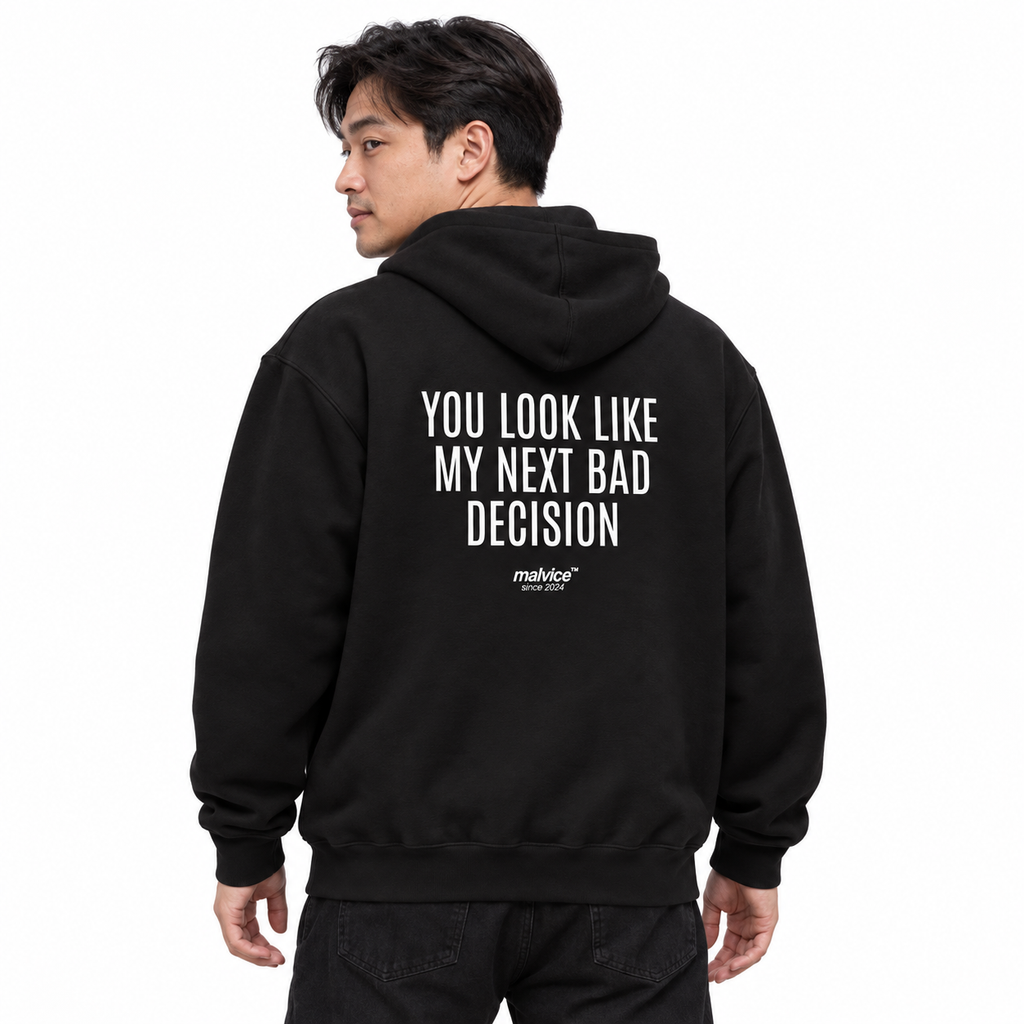 N018 YOU LOOK LIKE MY NEXT BAD DECISION Oversized Hoodie — black hoodie on male model, white studio — MALVICE