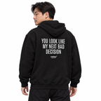 N018 YOU LOOK LIKE MY NEXT BAD DECISION Oversized Hoodie — black hoodie on male model, white studio — MALVICE