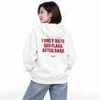 N021 — I ONLY DATE RED FLAGS AFTER DARK Oversized Hoodie — white oversized hoodie on female model, back view, white studio — MALVICE
