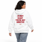 N023 — I’M NOT SCARY. YOU’RE JUST SENSITIVE Oversized Hoodie — white oversized hoodie on female model, back view, white studio — MALVICE