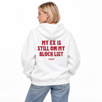 N024 — MY EX IS STILL ON MY BLOCK LIST Oversized Hoodie — white oversized hoodie on female model, back view, white studio — MALVICE