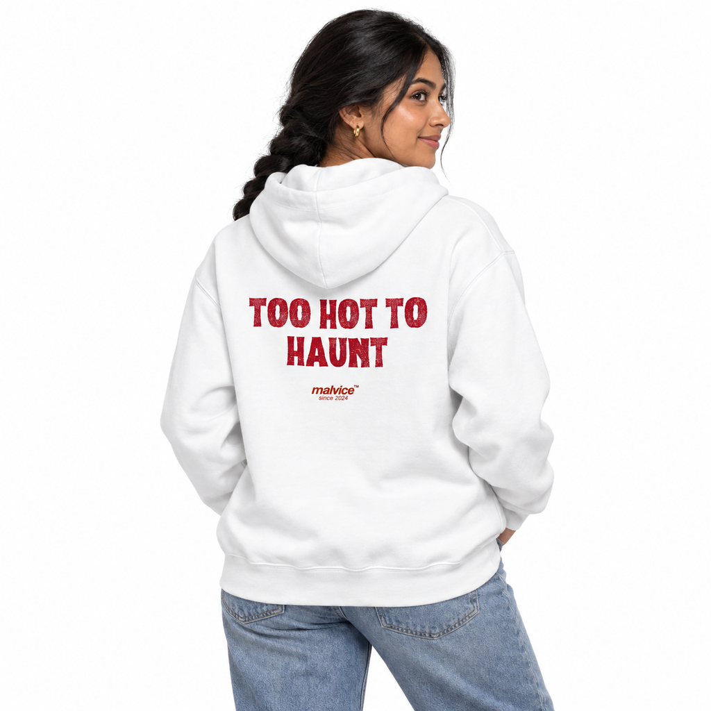 N026 — TOO HOT TO HAUNT Oversized Hoodie — white oversized hoodie on female model, back view, white studio — MALVICE