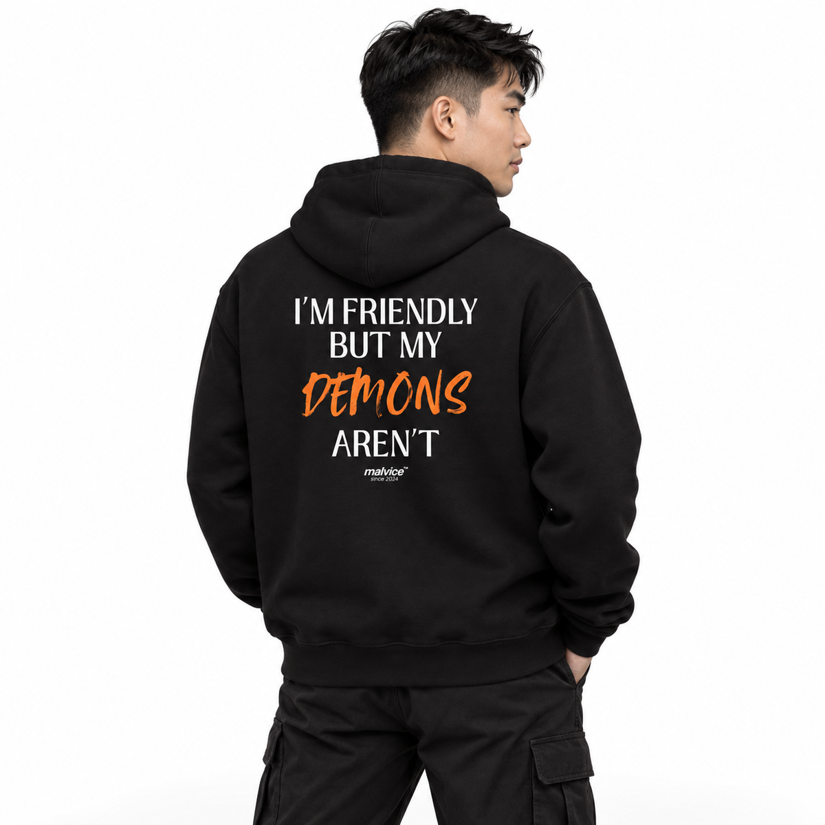 N028 — I’M FRIENDLY BUT MY DEMONS AREN’T Oversized Hoodie — black oversized hoodie on male model, back view, white studio — MALVICE