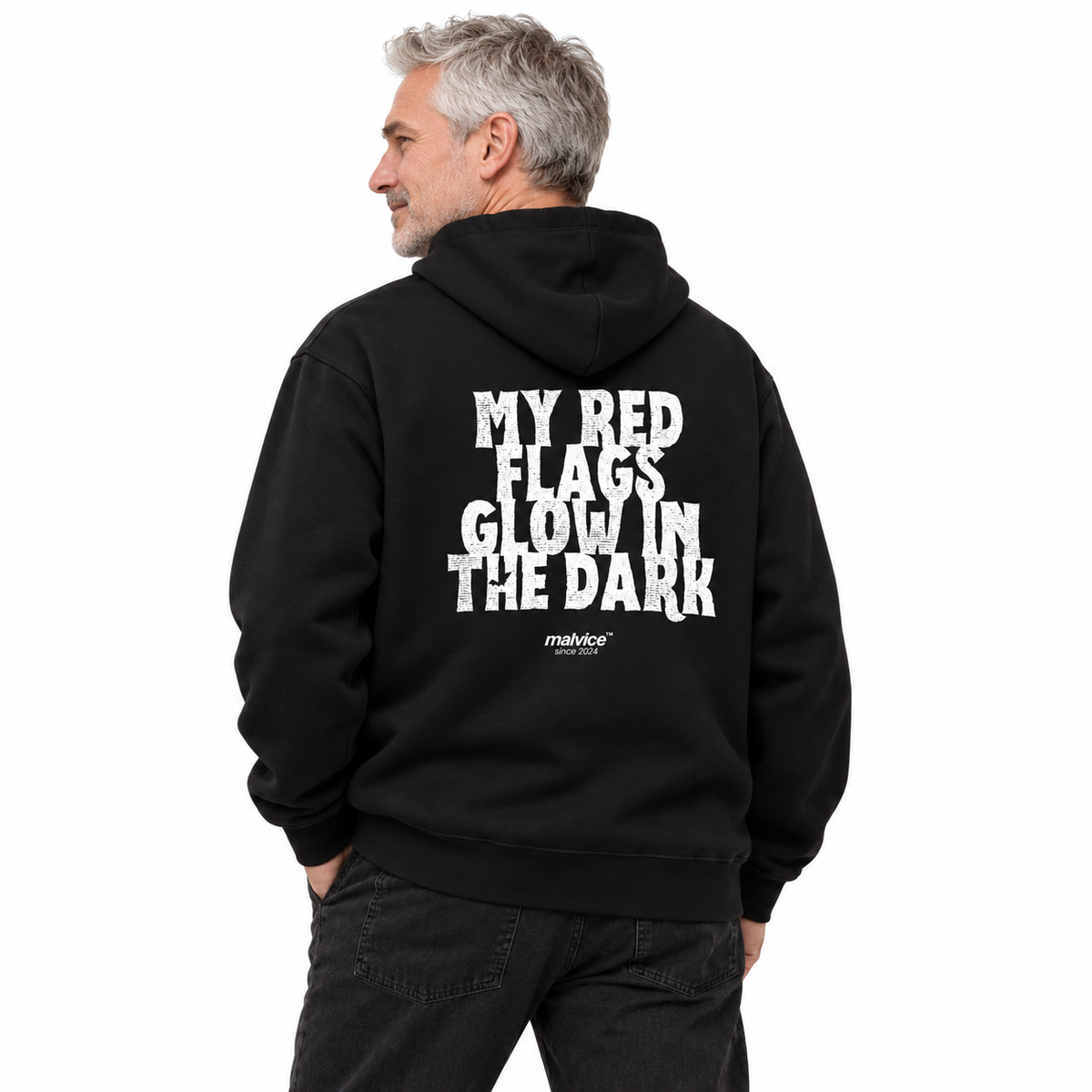 N029 — MY RED FLAGS GLOW IN THE DARK Oversized Hoodie — black oversized hoodie on male model, back view, white studio — MALVICE