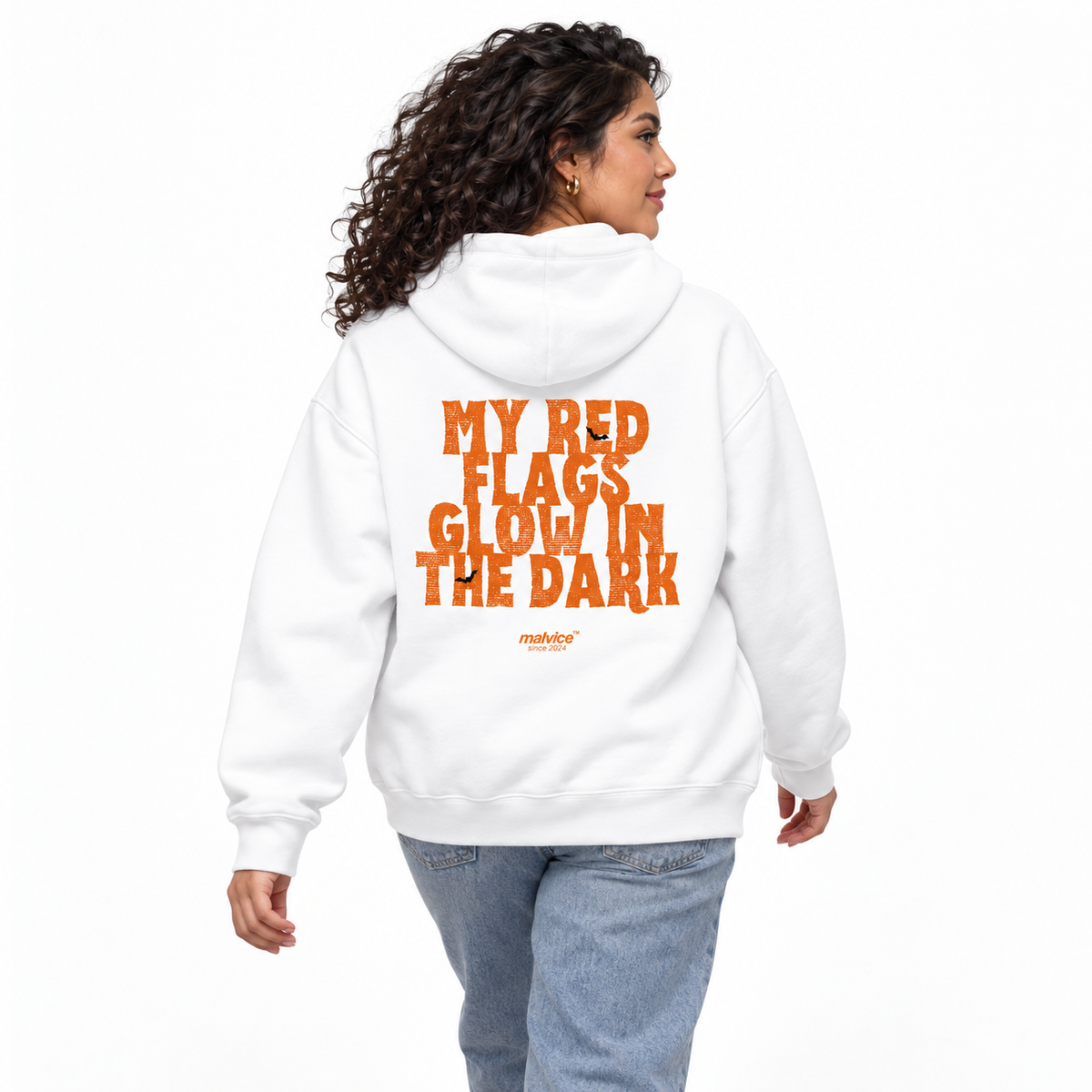 N029 — MY RED FLAGS GLOW IN THE DARK Oversized Hoodie — white oversized hoodie on female model, back view, white studio — MALVICE